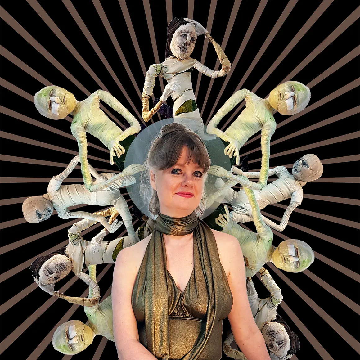 Teresa Wilson in front of her sculptural figures.